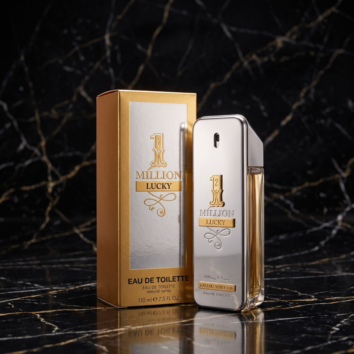 Paco Rabito 1 Million Lucky Eau de Toilette shown with its metallic gold and silver packaging box and matching rectangular perfume bottle on a dark marble surface.